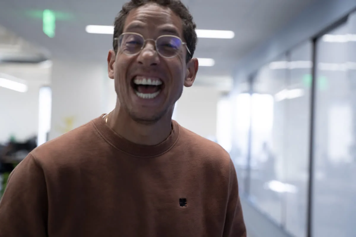 A teammate laughing in the office