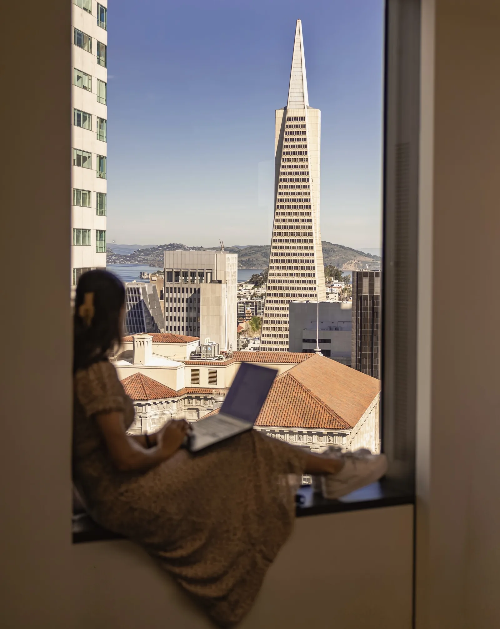 Working from the window seat, the Transamerica Pyramid in view