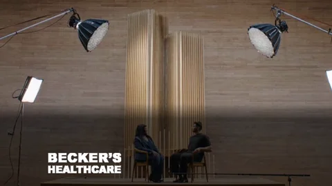 Two chairs on the Change Makers set, between the lights